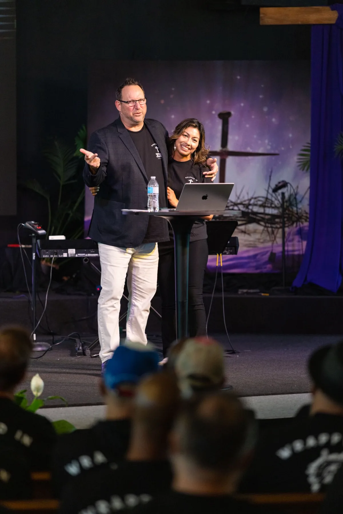 Michael and his wife on stage